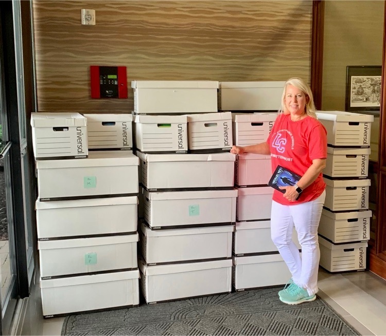 Mrs. Faulkner with donated books