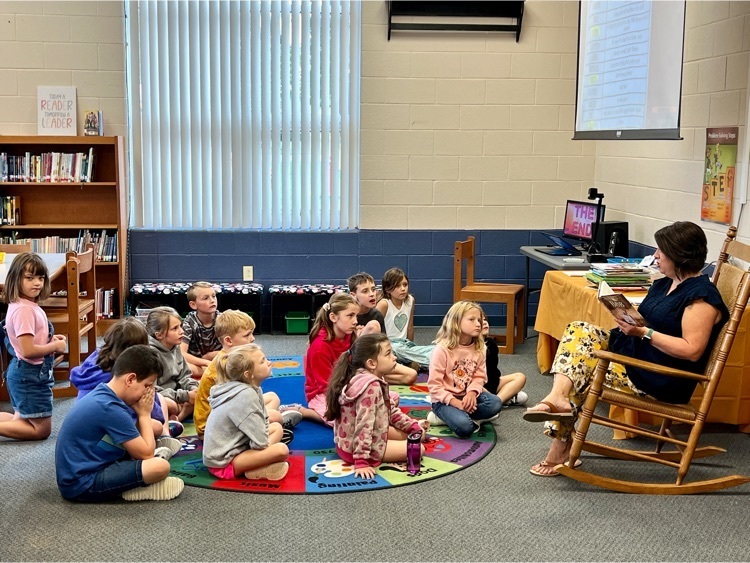 Ms. Ruckel reading to students
